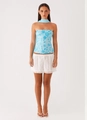 Detailed close-up of blue floral sequin embroidery on tube top and white eyelet skirt - S / Top And Bottom / Blue