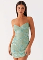 Slim fit mint green mini dress with blue floral sequin embroidery and beaded fringe details - Verdant