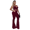 Detail of burgundy two-piece set featuring metallic eyelet trim on top and flared pants - S / Burgundy