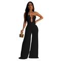 Detail of snake-shaped gold metal buckle and cutout on black strapless jumpsuit - S / Black