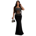 Dettaglio dell'elegante abito nero in mesh con strass argentati e taglio a sirena - S / Nero