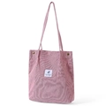 Pink corduroy tote bag for students featuring a feather patch and soft shoulder straps - Dusky Pink