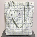 Corduroy tote bag in green and navy plaid with a button closure and brand patch - Tweed Green