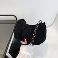 Chic black corduroy hobo bag with a gold and black chain link strap for women - Black