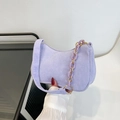 Purple corduroy underarm bag featuring a chunky resin chain and wide shoulder strap - Purple