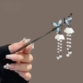 Traditional hair stick with blue enamel butterfly and white floral tassels - Black Lily of the Valley Pearl