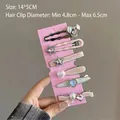 Detailed view of 6pcs metal hair clip set with hearts and stars on a 14x5cm card - Heart Star Pearl Rhinestone Style (图18) / Pink Gray White Silver