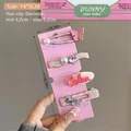 Detailed set of four stylish pink and silver hair clips with pearls and star tassels - Butterfly Heart Letter Tassel Style (图19) / Pink Cream White