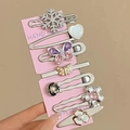 Détail d'un lot de 7 barrettes métalliques avec motifs papillons, fleurs et strass - Style Flocon de Neige Cœur Papillon Fleur Perle Artificielle (Fig. 22) / Argent Rose Violet Noir Blanc