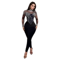 Detail of black mesh jumpsuit featuring intricate silver rhinestones and long sleeves - S / Black