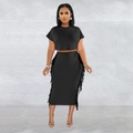 Women's chic black two-piece set featuring crop top and tassel fringe midi skirt - S / Black