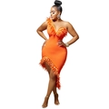 Detail view of orange one-shoulder dress featuring premium feather trim and asymmetric hemline - S / Orange