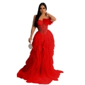 Detailed view of the red strapless gown featuring feathered corset and layered tulle skirt - S / Red
