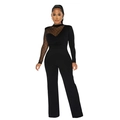 Details des durchsichtigen Punkt-Mesh-Ärmels und Patchwork am schwarzen Jumpsuit - S / Schwarz