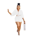 Detail view of white deep V-neck crop top and high-waisted shorts with waist tie detail - White