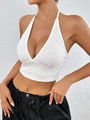 Witte halterneck crop top met open rug gemaakt van getextureerde geplooide stof - S / Wit