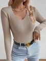 Detail of the scalloped V-neckline and ribbed texture on this khaki slim-fit knit sweater - Khaki