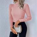 Detail shot of the vertical ribbed texture and mock neck on this pink knit sweater - S / Pink