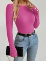 Detail of rose pink ribbed sweater sleeves with elegant decorative gold buttons - Rose Red