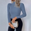Close-up of ribbed knit texture on a slim fit grey-blue turtleneck sweater for women - S / Aqua