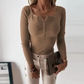Detail of tan ribbed knit top showing the square neckline and metal button placket - S / Khaki