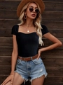 Close-up of black square-neck slim fit knit top with vertical ribbed fabric detail - XS / Black