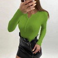 Close-up of bright green V-neck ribbed knit sweater with button details and long sleeves - Light Green