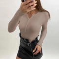 Detail of taupe ribbed knit long sleeve sweater with V-neck and button henley collar - Khaki