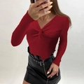 Detail of deep red ribbed knit sweater featuring a twist front and deep V-neckline - Burgundy