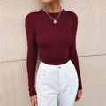 Detail of burgundy ribbed knit long sleeve sweater with slim fit and crew neck design - Burgundy