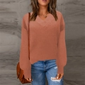 Detail of V-neck knit sweater featuring ribbed cuffs and trendy drop shoulder design - Orange
