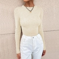 Detailed close-up of light beige ribbed knit sweater with elegant round neckline for women - Apricot