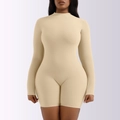 Close-up of the mock neck and high-elastic knit fabric on the apricot long sleeve bodysuit - Off White