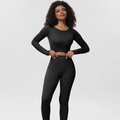 Detail view of seamless ribbed yoga set featuring long sleeve crop top and leggings - Black Long Sleeve And Leggings Style
