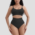 Détail de l'ensemble de lingerie sans couture noir nervuré montrant la texture élastique - S / Noir