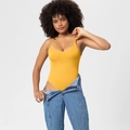 Seamless bright yellow rib-knit bodysuit paired with light blue denim jeans - S / Top And Bottom (Thong Style) / 1 Piece / Yellow