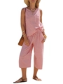 Dettaglio del top smanicato a righe bianche e rosse e pantaloni ampi cropped - S / Strisce rosse
