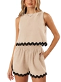 Close-up of beige linen set showing black scalloped embroidery on hem and shorts - Apricot