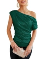 Detailed macro view of dark green sequin fabric with elegant side pleats on the shoulder - Green