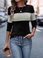 Dettaglio di un maglione a maniche lunghe in maglia con strisce color-block e trama a coste fini - S / Nero