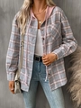 Detail of oversized plaid shirt with pink hood and grey orange check pattern texture - Gray