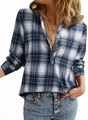 Detail of V-neck plaid shirt featuring classic blue-grey pattern and wooden buttons - Navy Blue