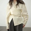 Detail of off-white wrap shirt with asymmetric waist folds and cutout neckline detail - S / Beige