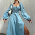 Detailed macro view of light blue crinkle fabric dress with chic side slit design - S / Light Blue