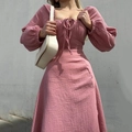 Detail of square neckline with bow tie and puff sleeves on a pink crinkled cotton dress - S / Pink