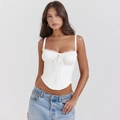 Detalle del top corsé blanco con encaje delicado, pecho fruncido y diseño de lazos - S / Tops / Blanco