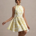 Elegant sleeveless A-line dress featuring yellow floral print and halter neck design - S / Yellow Floral