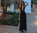 Elegant black backless halter dress with a deep V-neck and slim fit long silhouette - S / Black