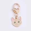 Golden cat head keychain with cream enamel and heart patterned lobster clasp - Sphynx Cat / 1.7*5cm 5g