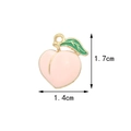 Pink enamel peach pendant charm with green leaf in golden finish for jewelry making - Peach
